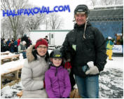 Kari, Cami and Andrew Tiffin with their dog Echo.